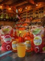 Bristol cider products, with pumpkins displayed in the background. 
